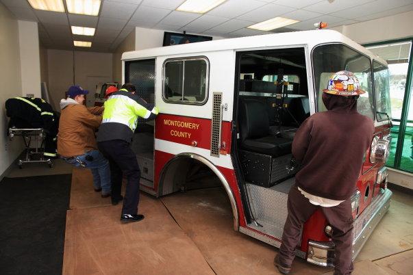 It's sure is hard to move this thing! I thought you said it was on wheels! Photo courtesy of Ed Tenney